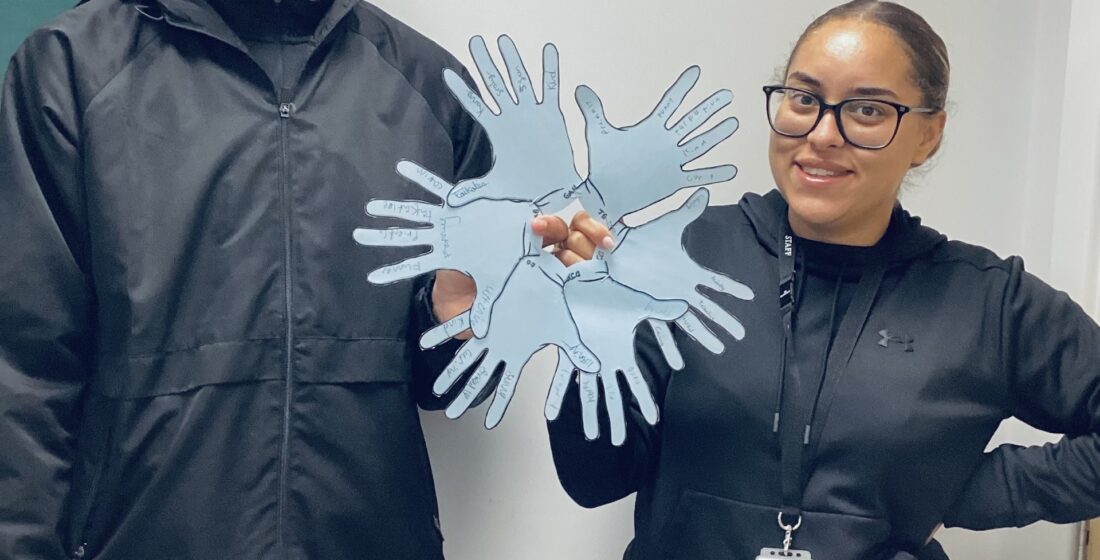 Coombswood School learners exchanging paper hands to celebrate kindness and friendship during Anti-Bullying Week.