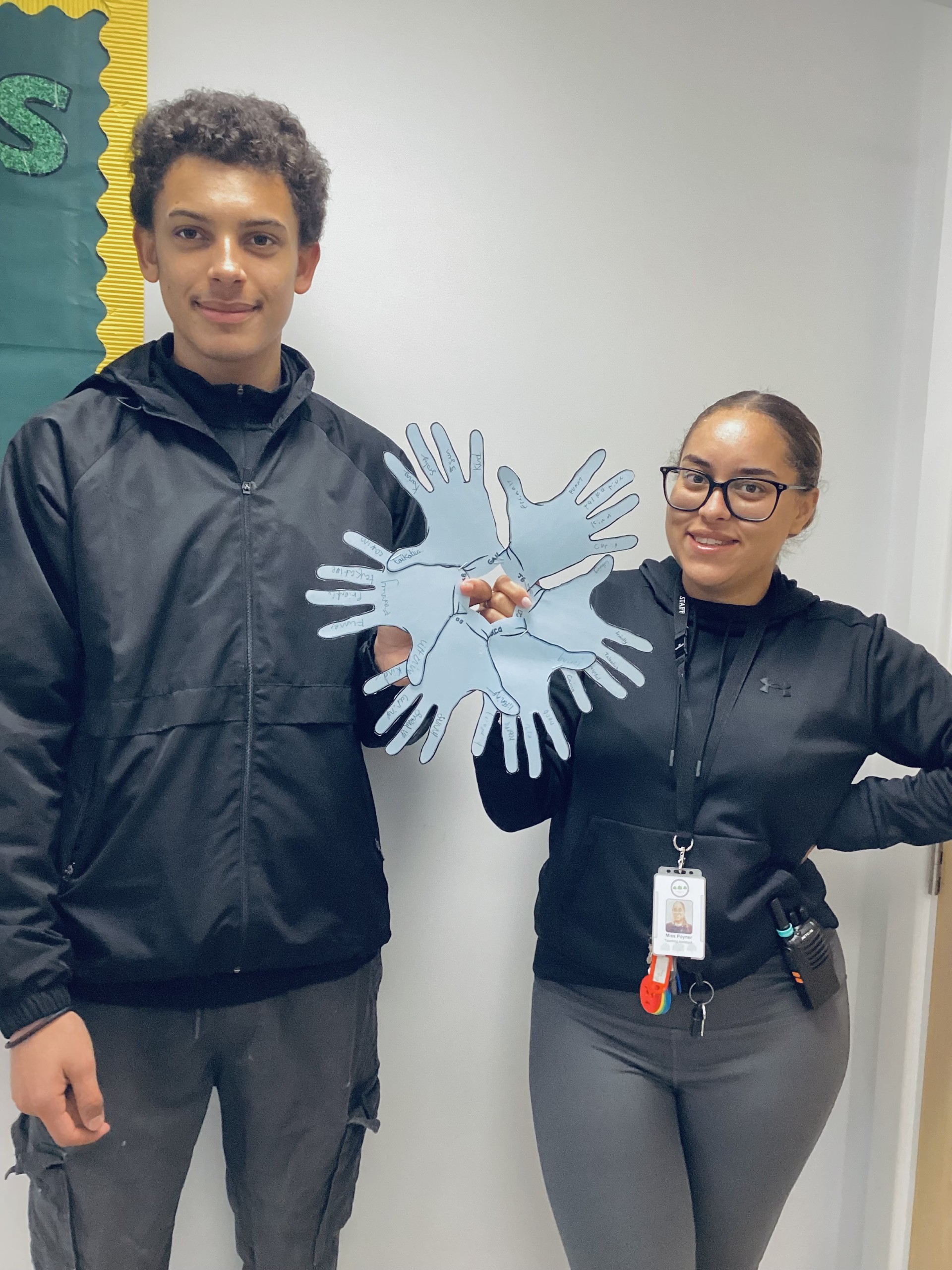 Coombswood School learners exchanging paper hands to celebrate kindness and friendship during Anti-Bullying Week.